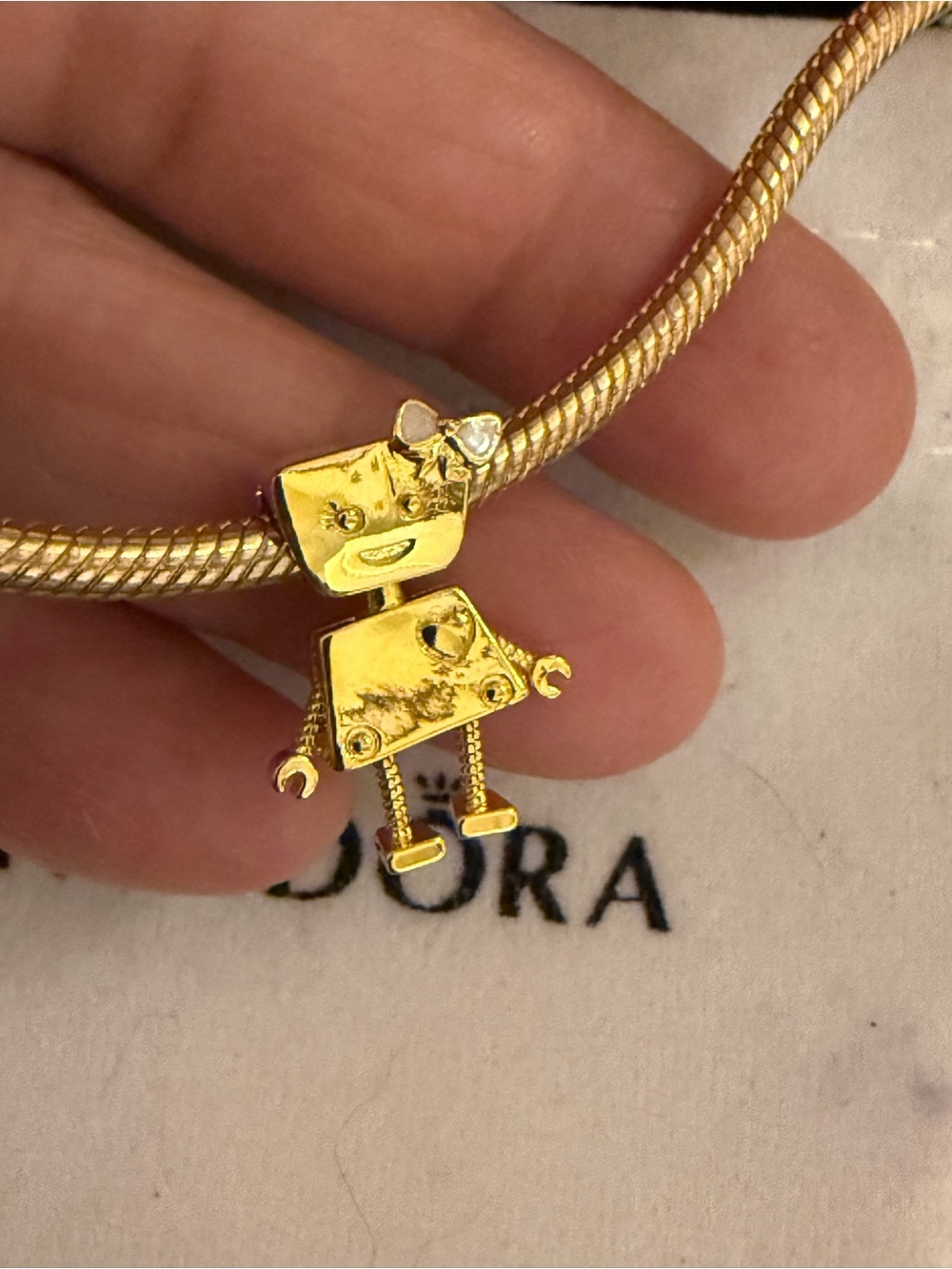 Pandora Gold Robot Charm on Gold Bracelet
